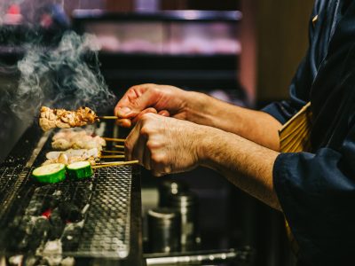Hands,Of,Japanese,Yakitori,Chef,Grilling,Chicken,Marinated,With,Ginger,